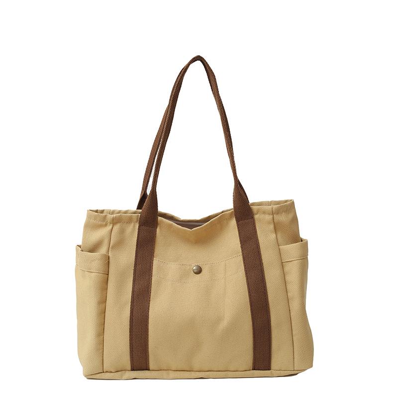 Женская холщовая сумка-тоут: Универсальная вместительная сумка с множеством карманов для студентов и пассажиров