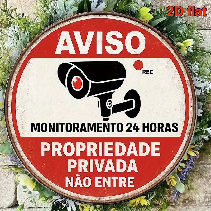 A Vintage Decorative Sign in Portuguese an X cm Round Aluminum Plaque Regarding Surveillance Cameras Serves As a W