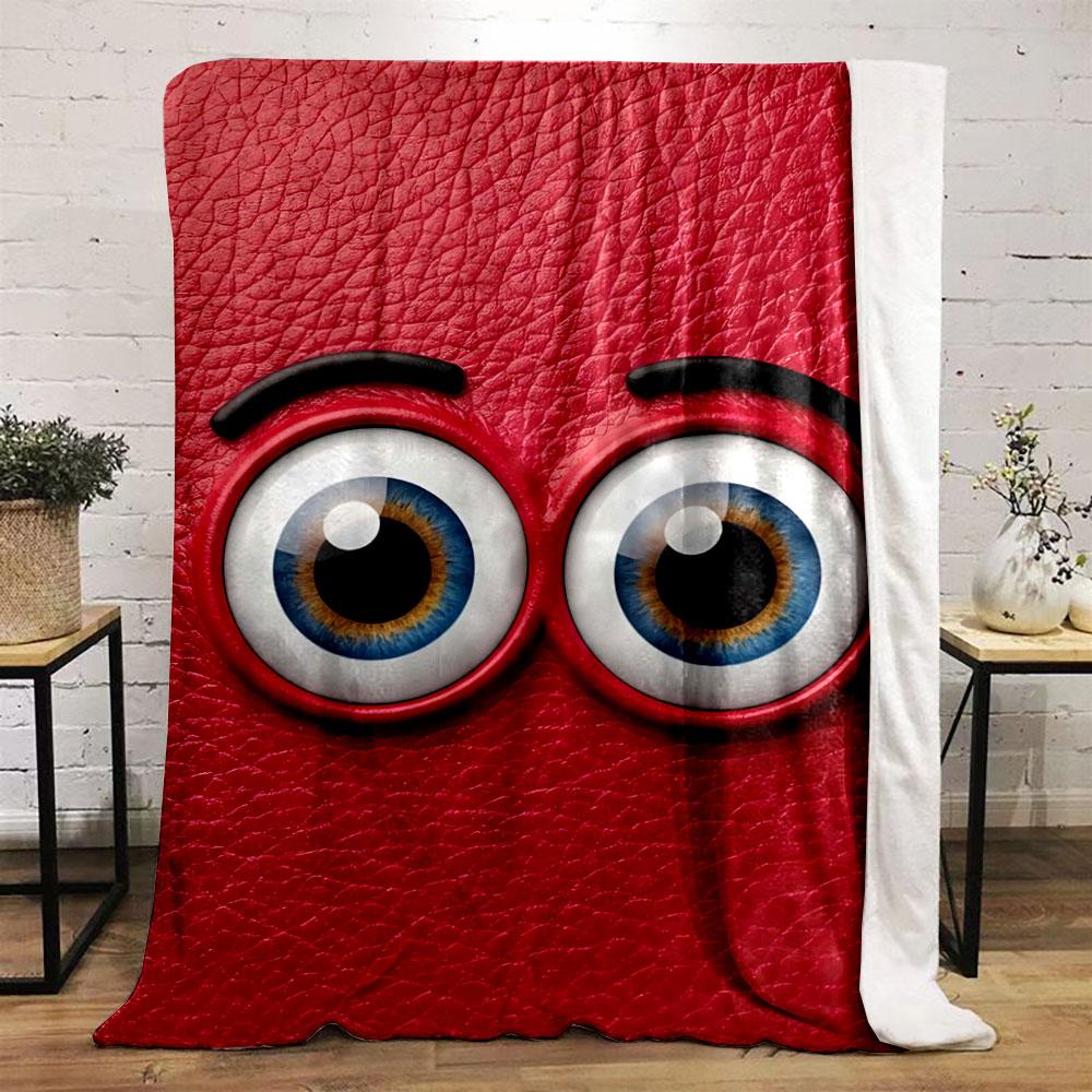 Blue cartoonish eyes on a textured red leather-like background. for all seasons blanket lunch break throw gift