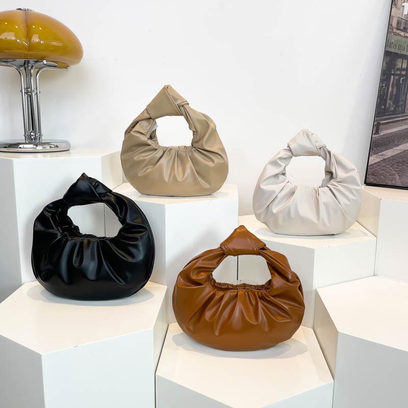 Простая плиссированная сумка в стиле ретро в форме полумесяца 2024 года, новая корейская версия, модная нишевая дизайнерская сумка