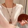 Retro Chinese Tassel Necklace: Unique Ethnic Style Women's High-End Clavicle Chain.