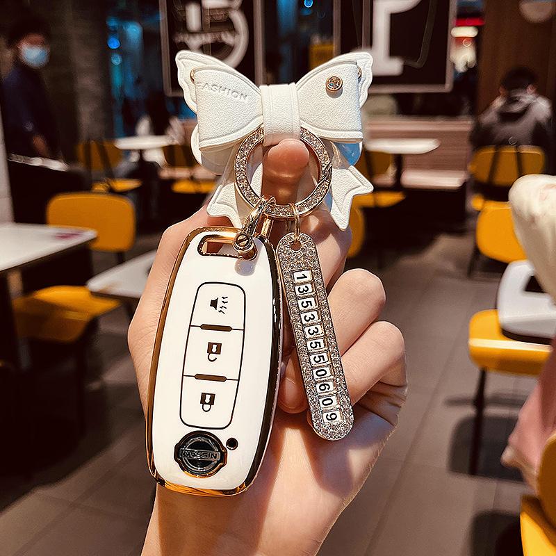 Применимо2023Новый чехол для ключей Nissan Teana Xuan Yi Сумка Nissan седьмого поколения Qashqai Qijun Shell22Сумка с пряжкой