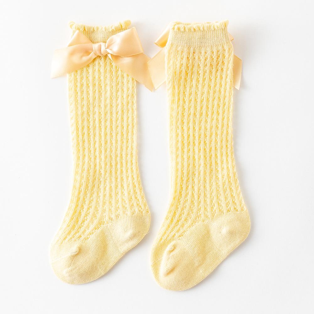 Летние носки для маленьких девочек, милые большие банты, мягкие хлопковые эластичные однотонные сетчатые носки для новорожденных, длинные носки до колена для маленьких девочек