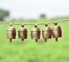 Small Metal Cow Bells 2 Inch Rustic Gold Set of 10 Handmade Jingle Bells for Crafts, Wind Chimes, Christmas Ornaments, Boho Home Decor