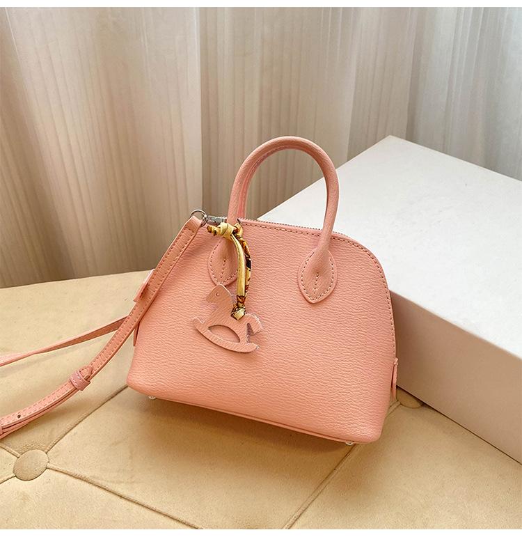 Премиальная мини-сумка-ракушка для женщин 2025 года, новая модная иностранная стильная изысканная сумка для переноски на одно плечо, диагональный пролет, воловья кожа, маленькая