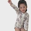 Stylish Floral Long-Sleeve Girls' Swimsuit with Sun Protection for Beach or Hot Spring Vacations