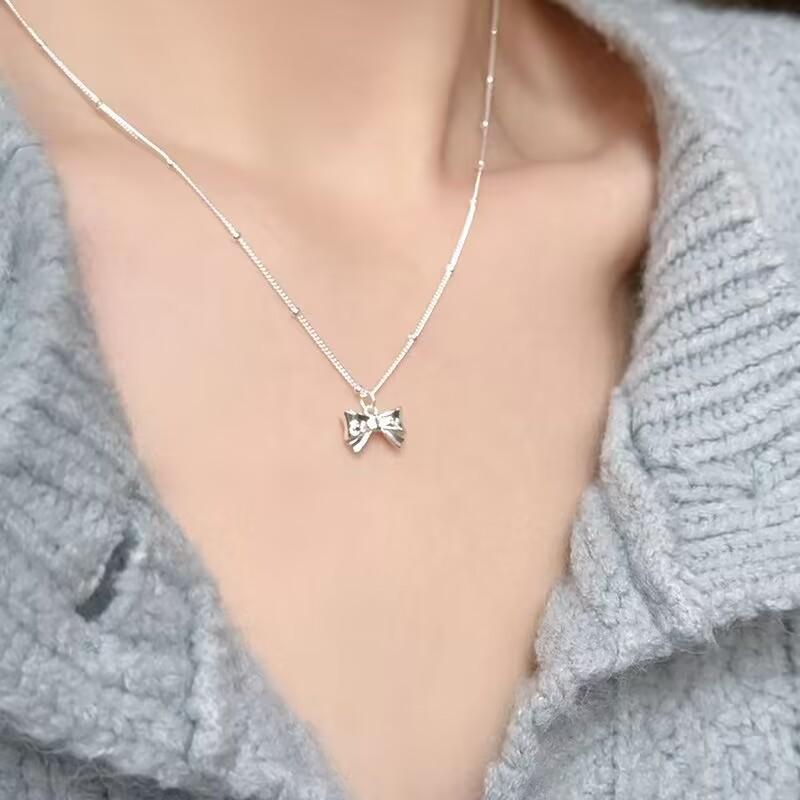 Легкая роскошь мода ниша дизайн чувство бант кулон ожерелье женский интернет знаменитость ключица цепочка