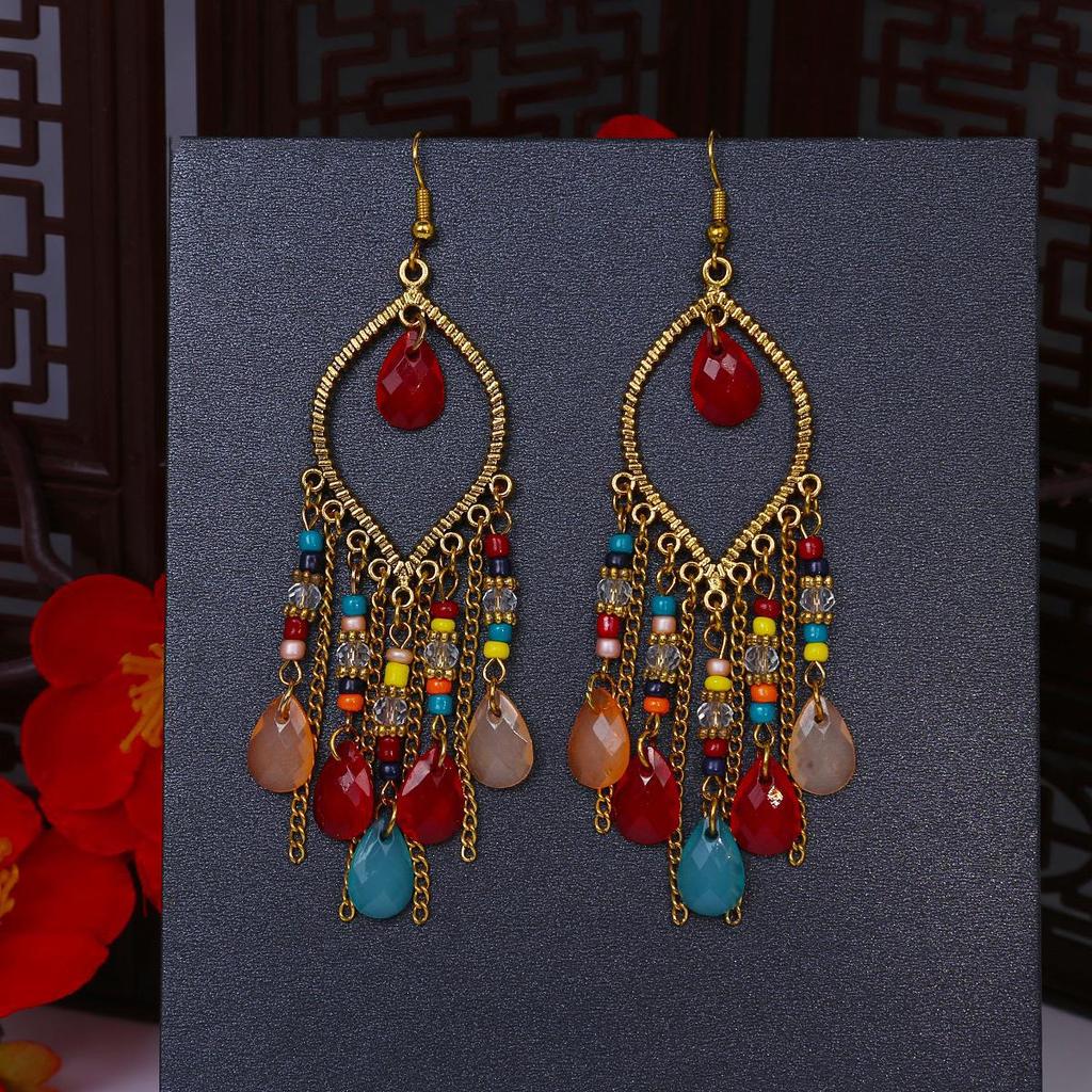 Серьги-кисточки с рисовыми бусинами и каплями воды в стиле бохо - этнический стиль, яркая индивидуальность