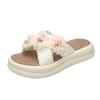 Beautiful pearl flower slippers female summer wear 2025 new fairy wind soft bottom one-word thick bottom beach sandals