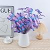 An artificial butterfly branch used for weddings, family offices, parties, decorating vases, and floral arrangements