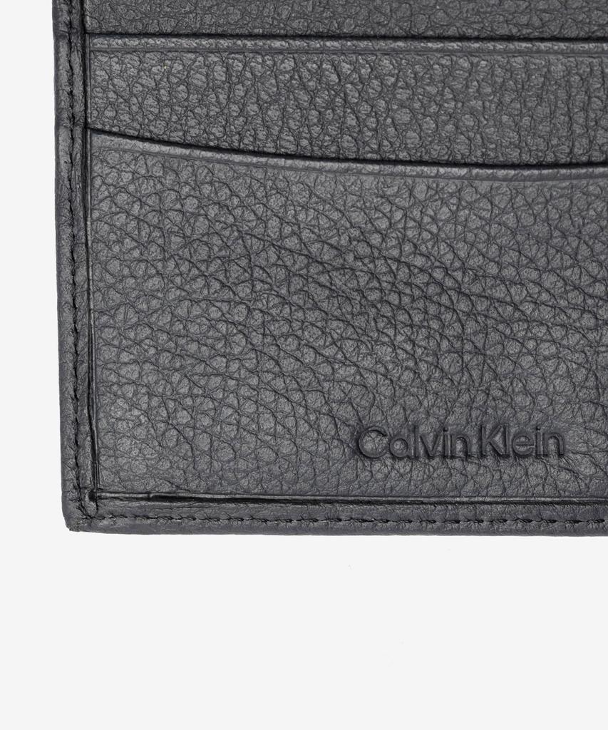 Кошелек 31CK130031 КАРМАН ДЛЯ БАНКНОТ [Calvin Klein] Складывающийся вдвое С ОТДЕЛЕНИЕМ ДЛЯ МОНЕТ Мужской ЧЕРНЫЙ/Черный [Б/У]
