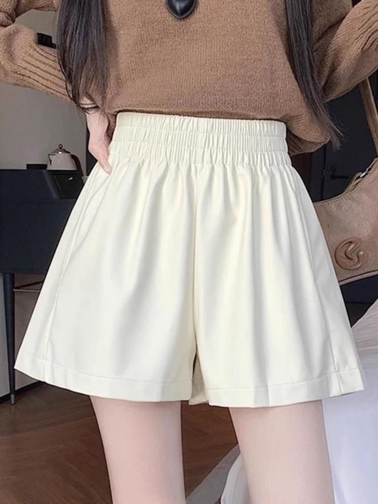 Женские коричневые кожаные шорты с высокой талией - осень/зима 2023 года, облегающий широкий силуэт, из искусственной кожи.