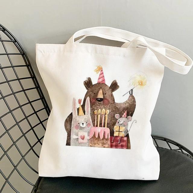 2022 Лето Новая женская дизайнерская сумка с мультяшным принтом Женская белая простая сумка через плечо Большой емкости Повседневная сумка Холст H