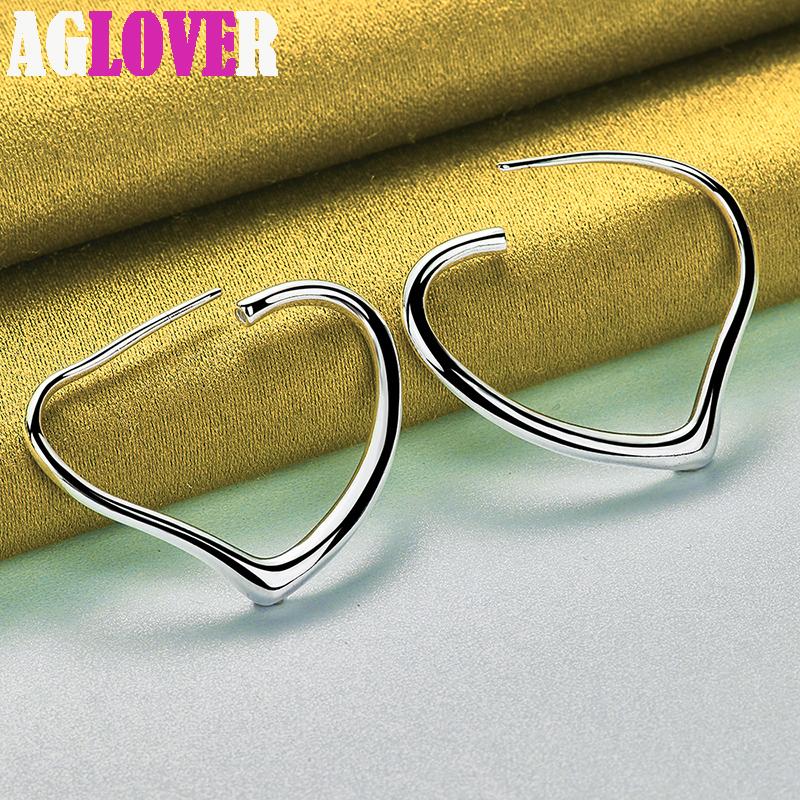 Ювелирные изделия: серьги-кольца из стерлингового серебра 925 пробы с сердцем 29x37 мм