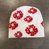 Вязаная модная шапка с цветочным принтом и функцией сохранения тепла для холодных сезонов.