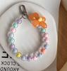 Hot Selling Colorful Fashion Women's Hanging Chain Ring Code Wrist Strap Clip Cute Flower Bead Mobile Phone Lanyard