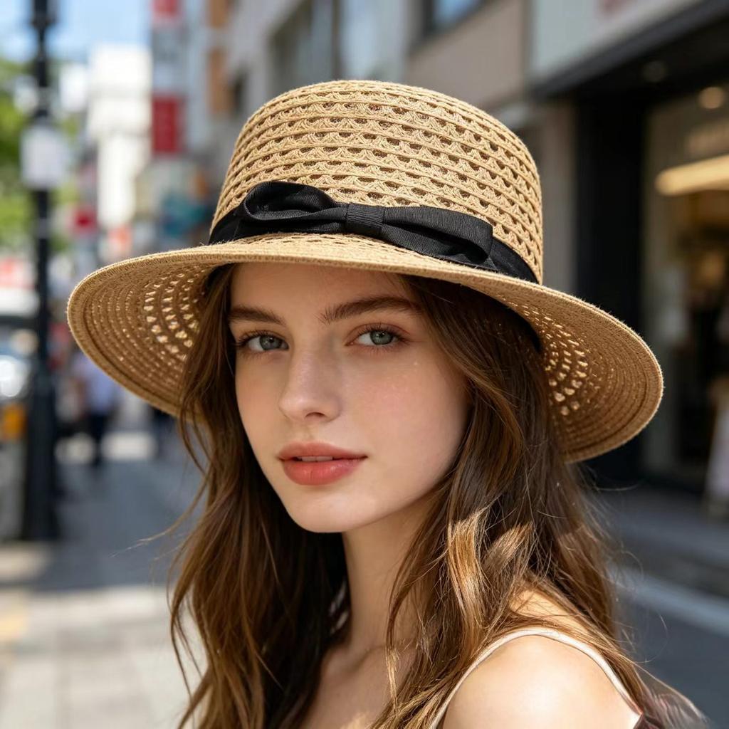 Fine grass hollow fine webbing bow big eaves flat top straw hat vacation travel sunshade sun protection outdoor straw hat
