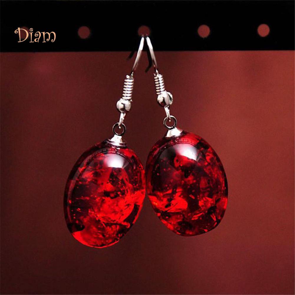 Овальные висячие серьги из искусственного янтаря