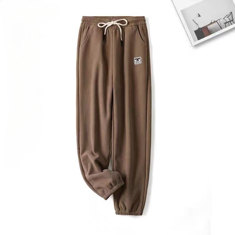 Зимние теплые штаны Зимние санитарные штаны с утолщенным хлопком Женские вертикальные полосы для похудения и свободного кроя Женские брюки