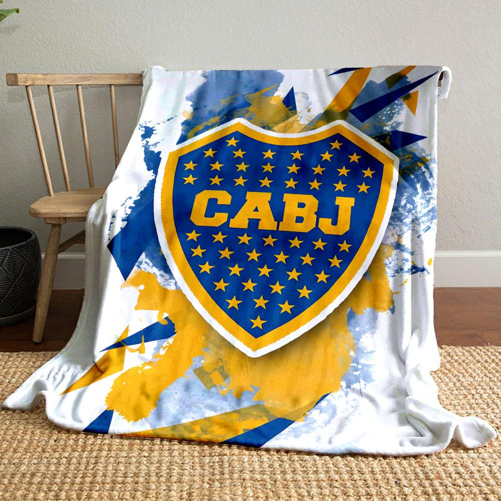 Blue and yellow shield with stars, splattered background, angular shapes. for all seasons blanket lunch break throw gift