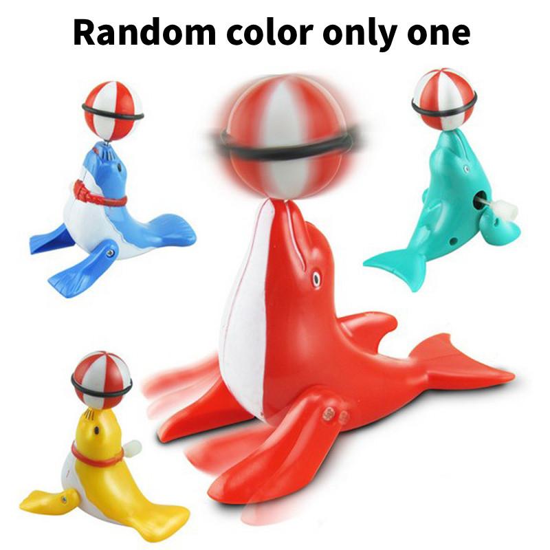 Mechanical Dolphin Rotating Toy With Chain Link Top Ball For Kids Learning And Interactive Play