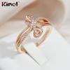 Женское кольцо Kinel с бантом из розового золота и циркона