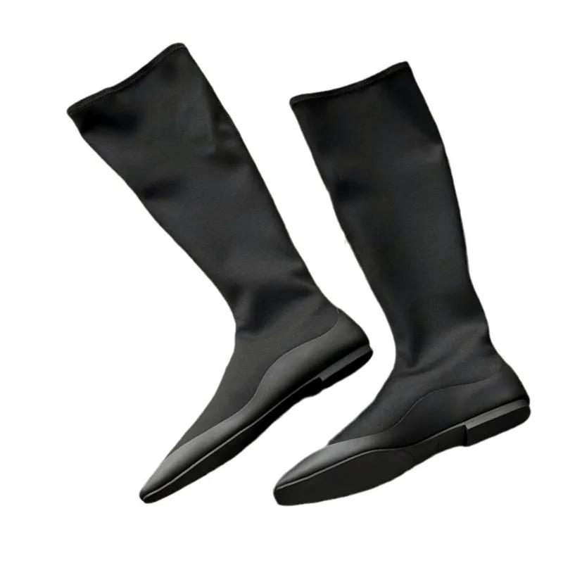 Модные черные сапоги с плоским квадратным носком и внутренней частью, эластичные сапоги для женщин, модные тонкие сапоги из эластичной ткани до колена, зимняя теплая удобная обувь 2025 года