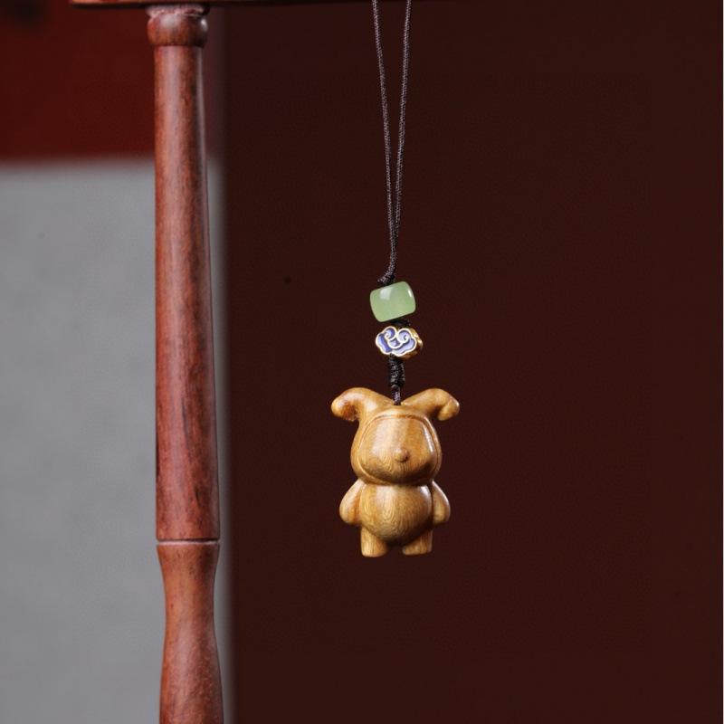 Twelve Zodiac Animal Charms Green Sandalwood Set: Rat, Ox, Tiger, Rabbit, Dragon, Snake, Horse, Sheep, Monkey, Rooster, Dog, Pig.