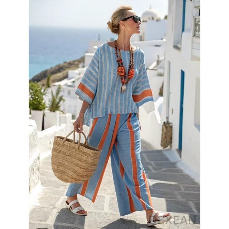 A new summer women's clothing, printed striped color matching medium-sleeved crew neck top, straight casual suit.