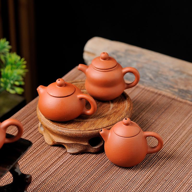 Mini Purple Sand Children's Set Handle Pot Small Teapot Fingertip Pot Tea Pet Pot Can Be Placed To Raise Xishi Small Kung Fu Tea Set