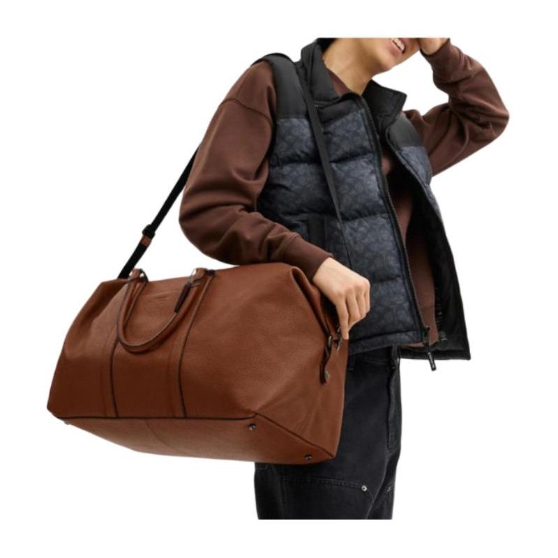 COACH Trekker Series 52 Large Capacity Solid Color Pebbled Leather Travel Bag Handheld Crossbody Bag Large Men's Saddle Brown