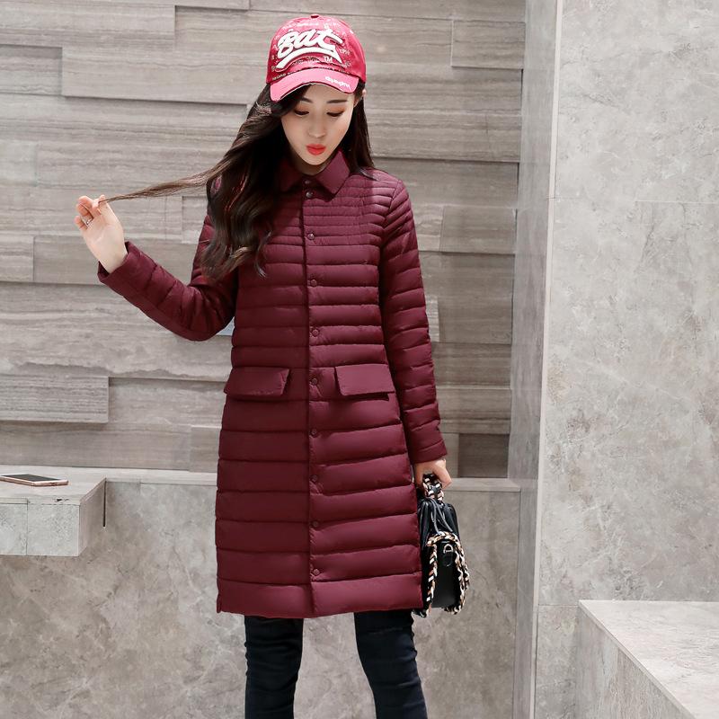 Осень и зима новая корейская версия облегающего кроя средней и длинной куртки-пуховика женская тонкая лацкан большого размера с длинным рукавом оптовая тенденция