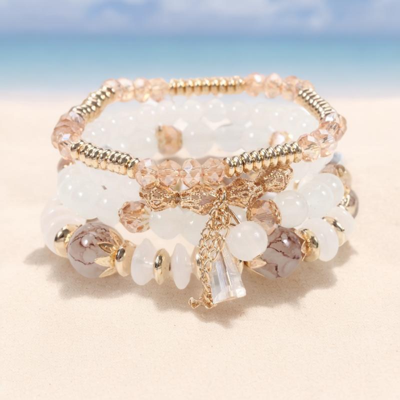 Шикарный женский браслет в стиле бохо с четырьмя слоями стеклянных бусин и кисточками