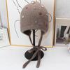 Autumn and winter Angola rabbit fur ear protection knitted hat women's color button decorative lace-up wool hat outdoor cold hat tide