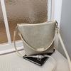 Niche woven pattern bag women's new simple bucket bag casual commuter shoulder messenger bag