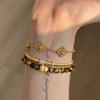 Old Money Style~French-style hollow-out, full-diamond, floral four-leaf clover and iris flower bracelet for women, vintage niche high-end jewelry