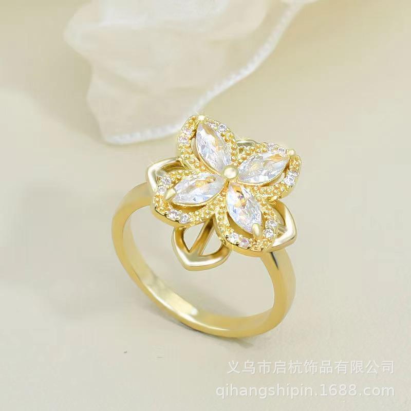 Вращающееся ожерелье из титановой стали в виде четырехлепесткового цветка, женственный стиль, свежий и простой темперамент, инкрустированное цирконом, аксессуары-подвески