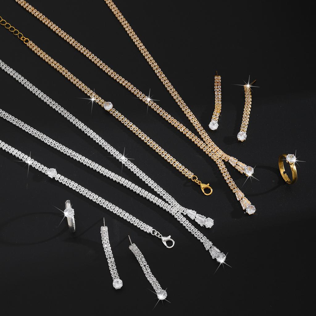 2026 Набор из четырех предметов: Простая цепочка на ключицы, Изысканная цепочка с когтями, Серьги с круглым цирконом и кристаллом, Ожерелье, Браслет, Кольцо