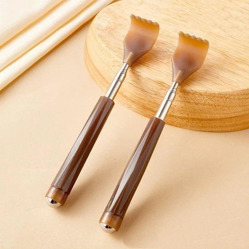 This Portable, Retractable Back Scratcher Features A 360-Degree Rotating Massage Ball On The Handle.