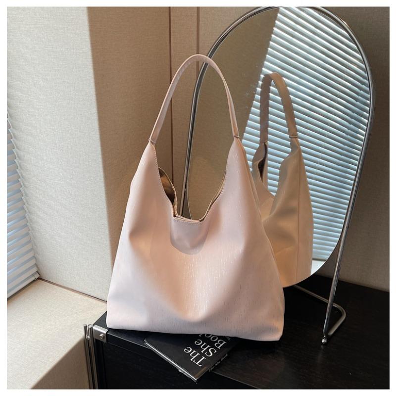 Вместительная сумка подмышку женская новая модная трендовая сумка на плечо для通勤, универсальная повседневная сумка-тоут