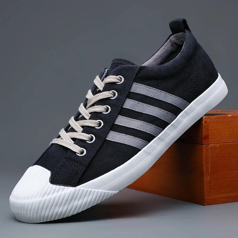 Новые туфли для мужчин. Повседневная обувь из парусины. Весна-лето. Полосатые туфли на плоской подошве для скейтбординга. Молодежные кроссовки на шнуровке.