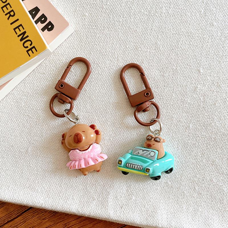 1 шт. мультяшный капибала брелок креативный капибара телефон кулон наушники чехол подвески сумка декор автомобильный брелок аксессуары