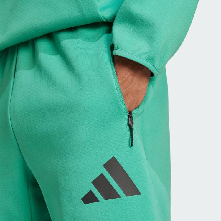 adidas ЗНЕ. Мужские тренировочные брюки с зауженными манжетами, regular fit, вязаные, черные JD6442