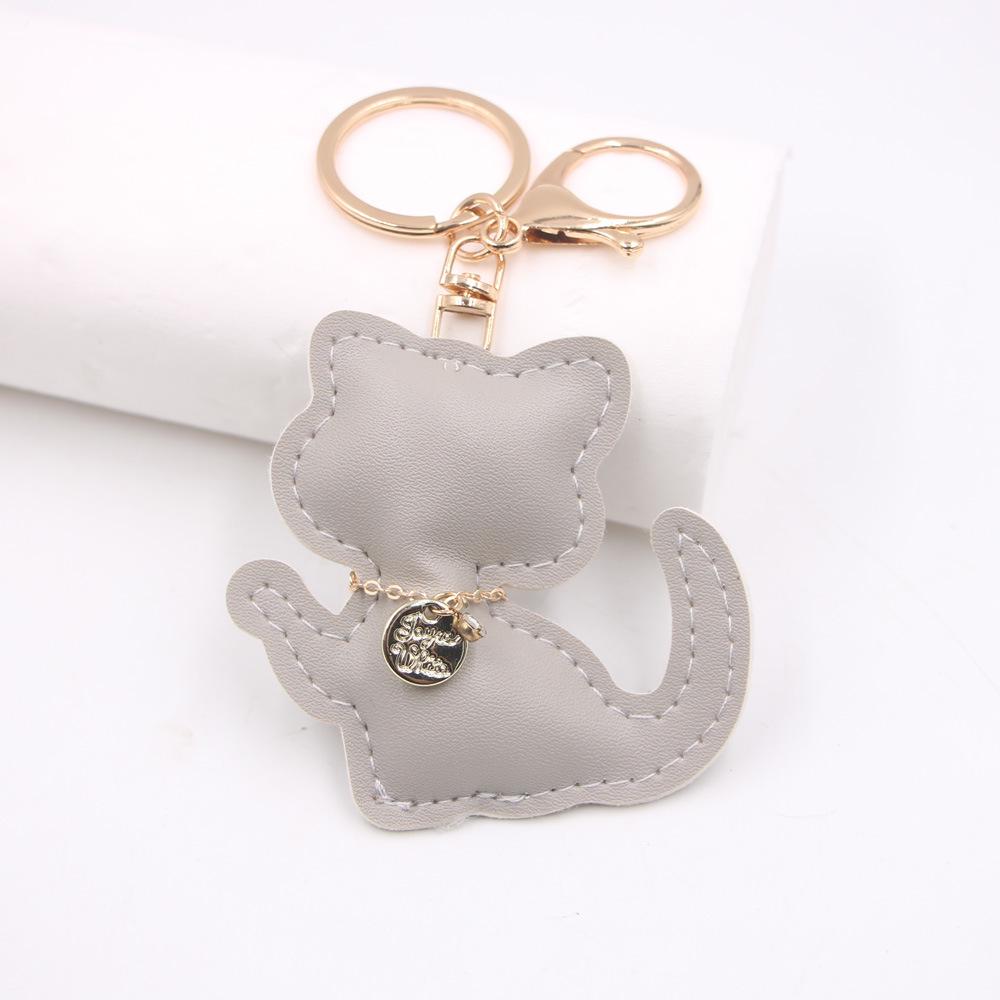 Очаровательный кожаный брелок в виде котенка - подвеска в виде счастливого кота для сумок и автомобилей
