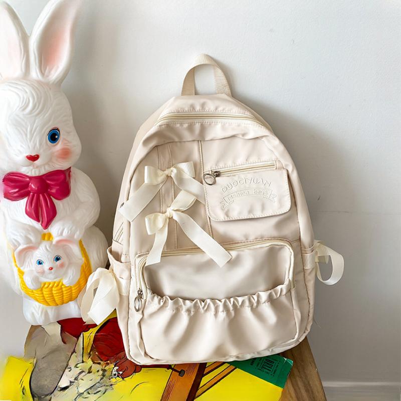 Милые школьные сумки с бантом для колледжа, контрастные нейлоновые рюкзаки для учеников младших классов средней школы, большая вместимость, сумка через плечо для девочек-подростков