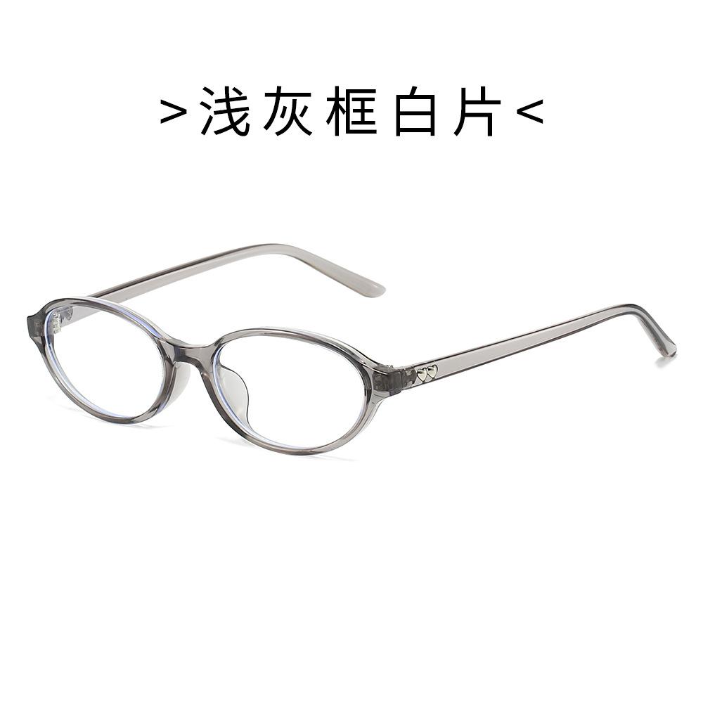 Oval frame sunglasses, retro style, heart-shaped temple arms, UV protection