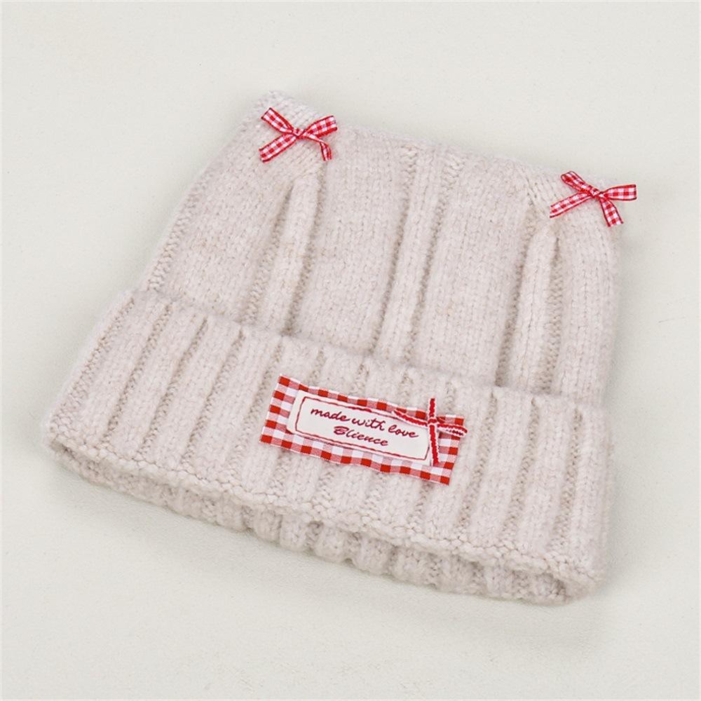 Sweet bow cat ear knitted pullover hat for women, small face in autumn and winter, warm and fashionable versatile wool hat