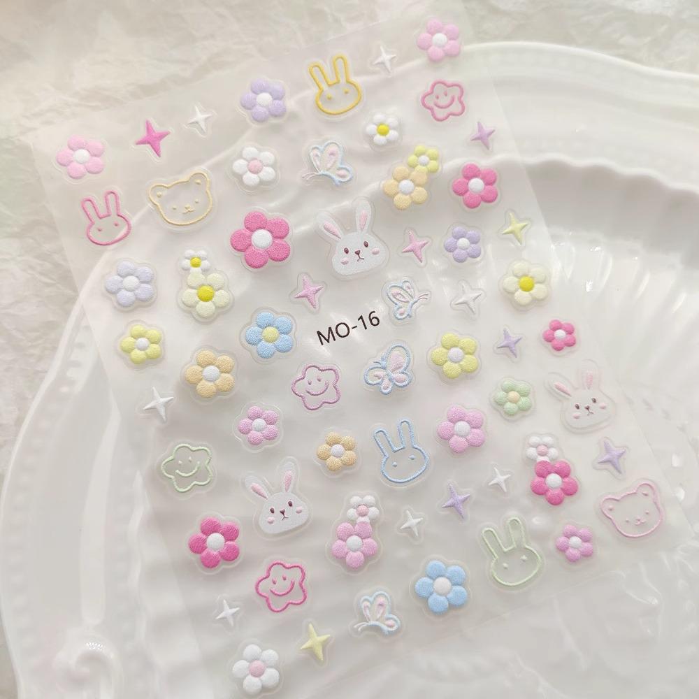 Наклейки для нейл-арта с цветочным и мультяшным рисунком: Цветы, ромашки, тюльпаны, кролик, любовь, бабочки.