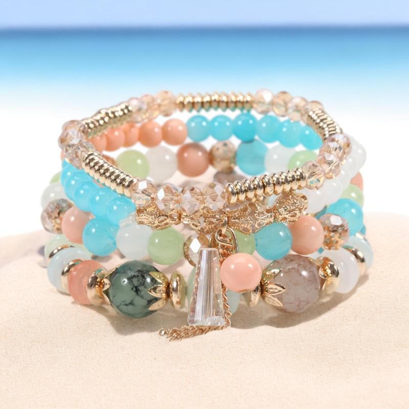 Шикарный женский браслет в стиле бохо с четырьмя слоями стеклянных бусин и кисточками