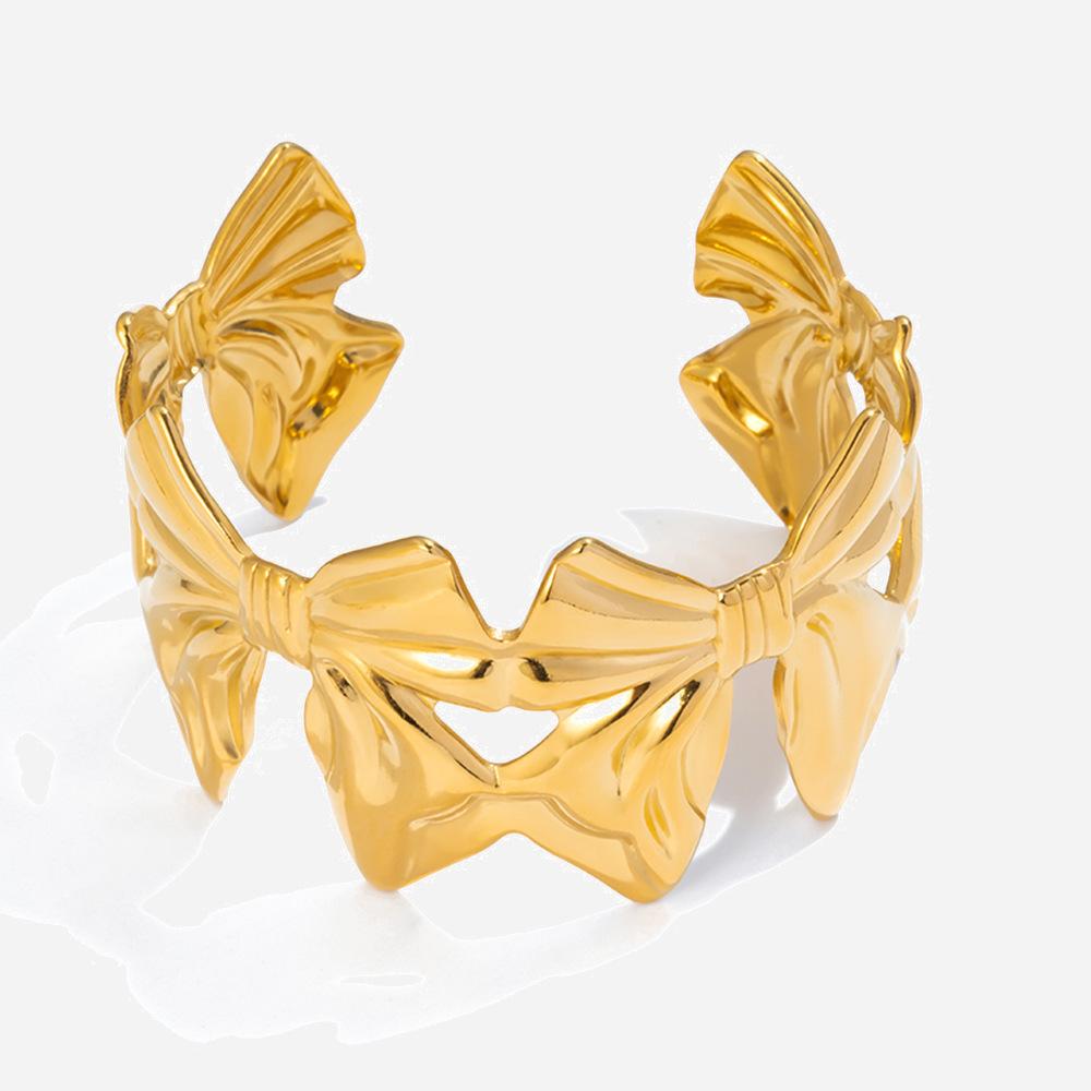 Сладкий и романтичный дизайн, ювелирное изделие - браслет-бант из золота 18 карат